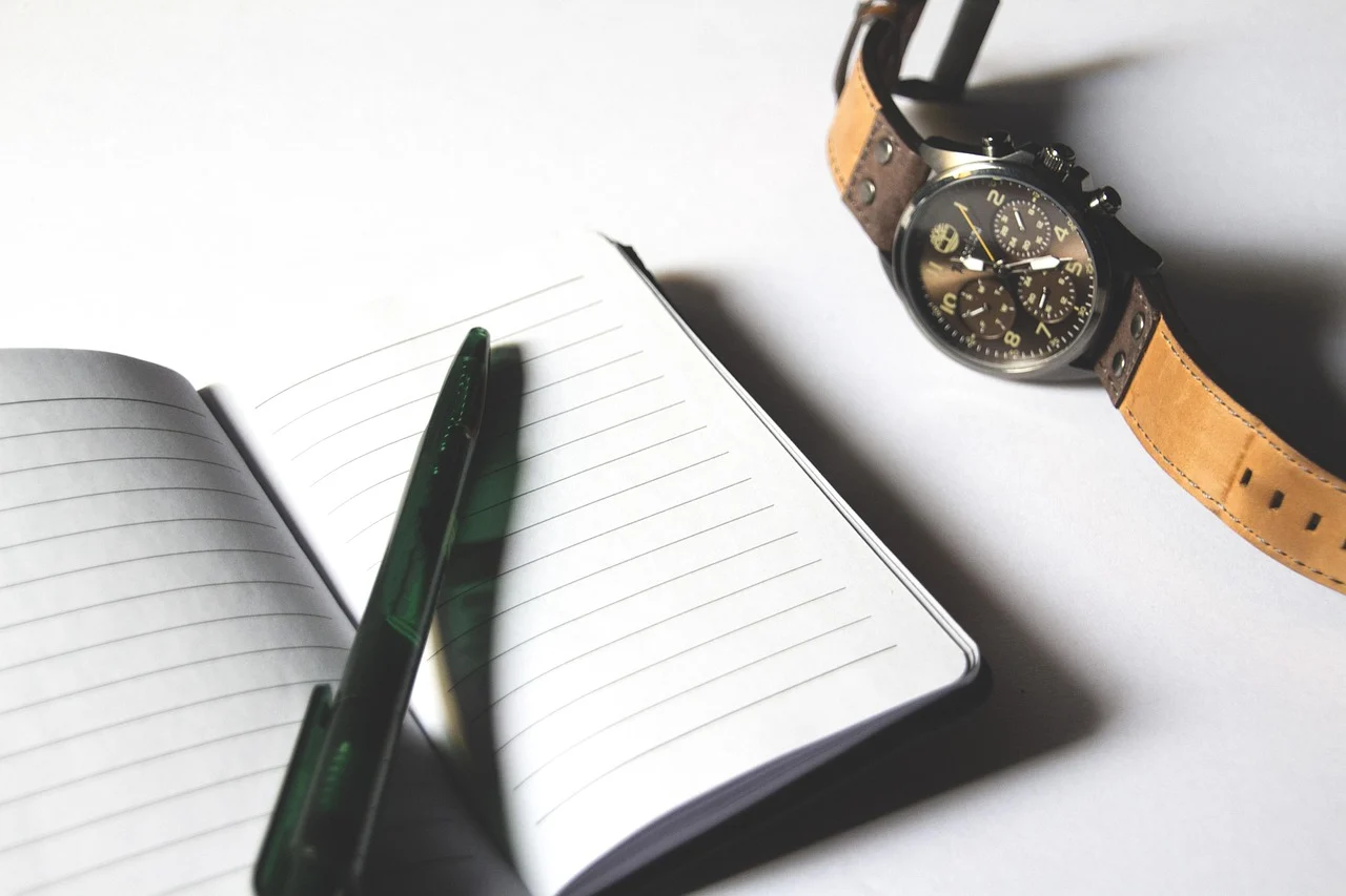 content optimization checklist on a notebook with a pen